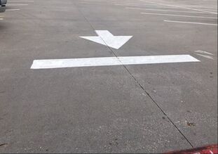 Directional arrows in your parking lot in Tampa, Florida
